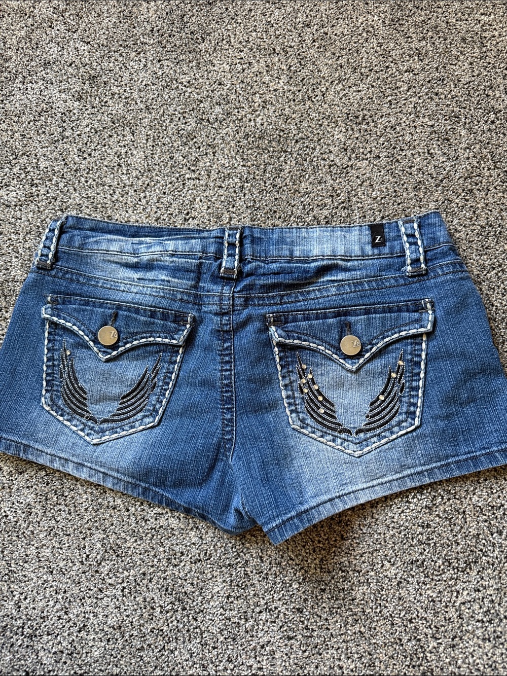 Worn-in Blue Denim Women’s Shorts with Embellished Back Pockets
